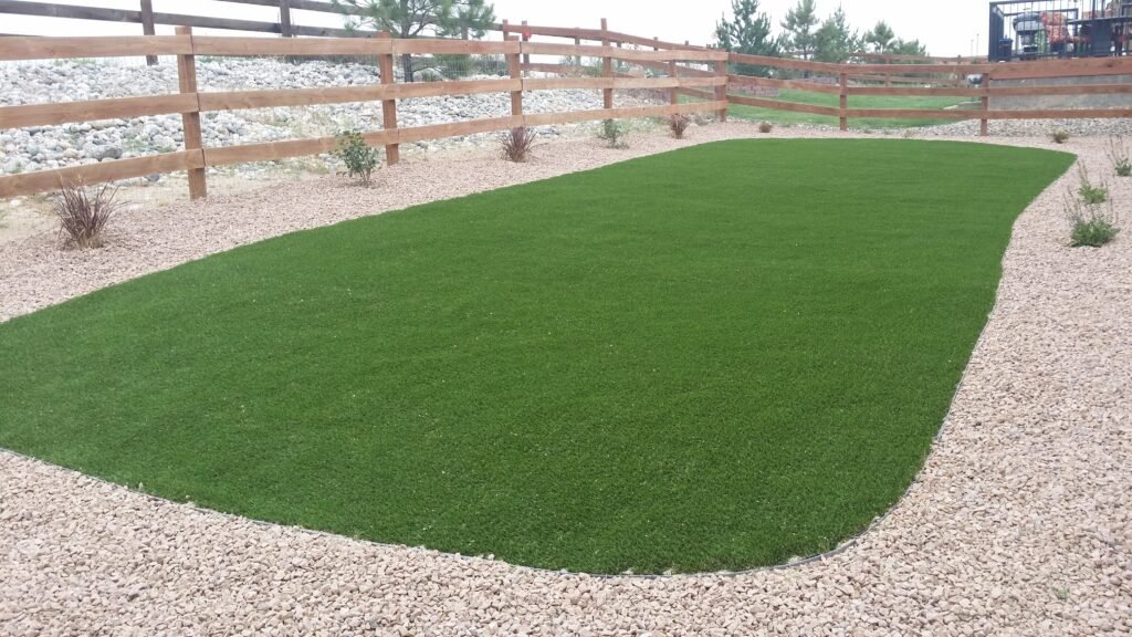 Front yard transformation from unfinished dirt to polished xeriscape with plants and rock


