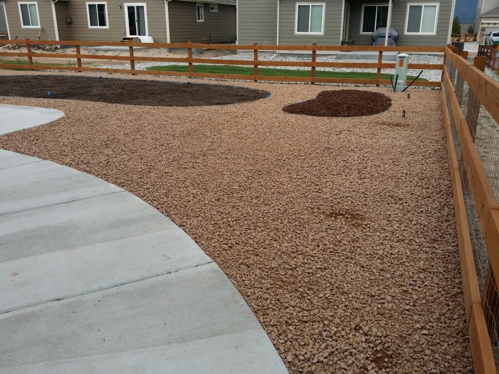Water-wise xeriscape front yard featuring native shrubs, mulch, and drip irrigation

