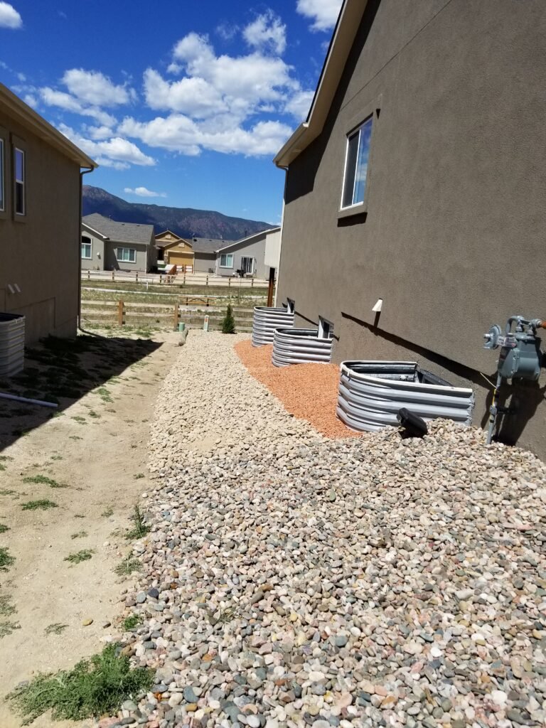 Water-wise xeriscape front yard featuring native shrubs, mulch, and drip irrigation

