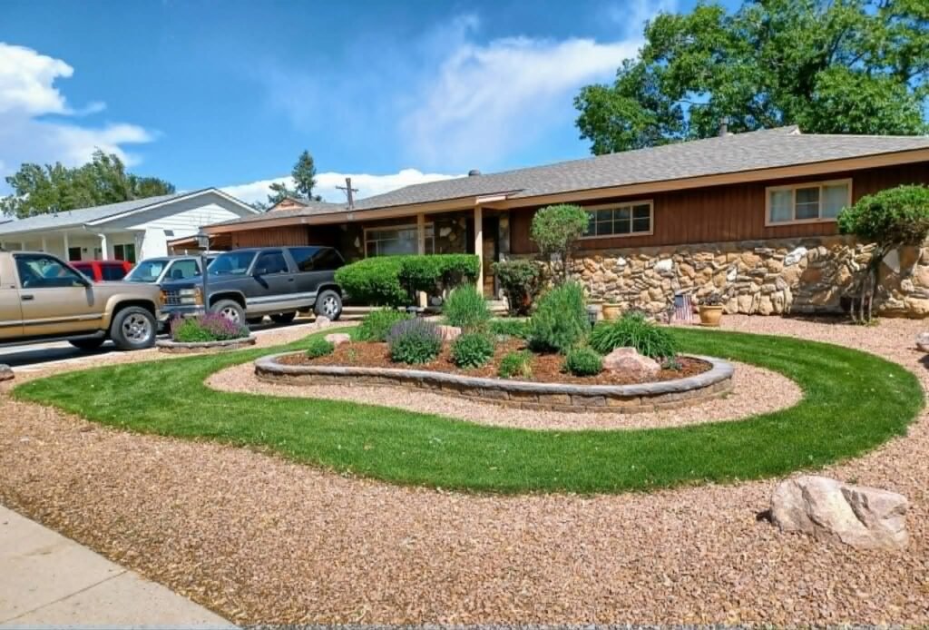 Water-wise xeriscape front yard featuring native shrubs, mulch, and drip irrigation

